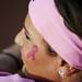 A Michigan softball player wears a temporary tattoo during the Pink Game to rise awareness for the Making Strides Against Breast Cancer organization on Friday, May 3. Daniel Brenner I AnnArbor.com